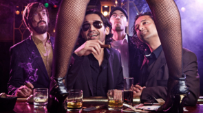 guys looking at girl dancing striptease